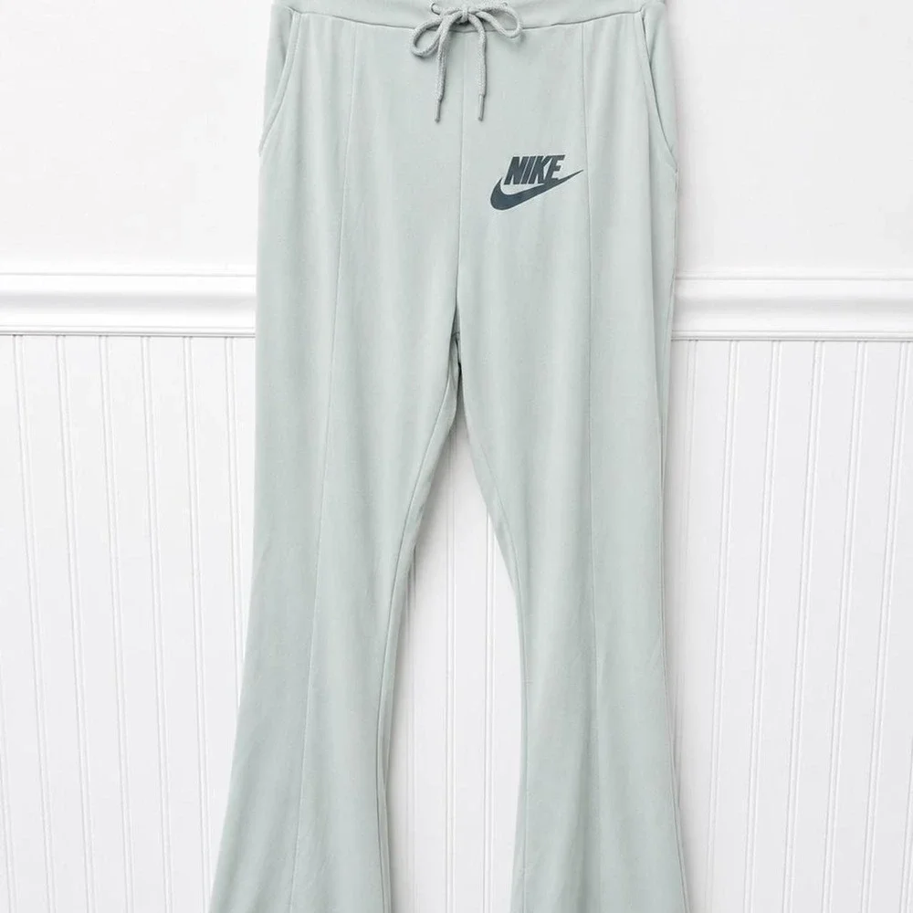 Nike Two Piece Cropped Zip-Up Jacket & Flared Track Pant Set